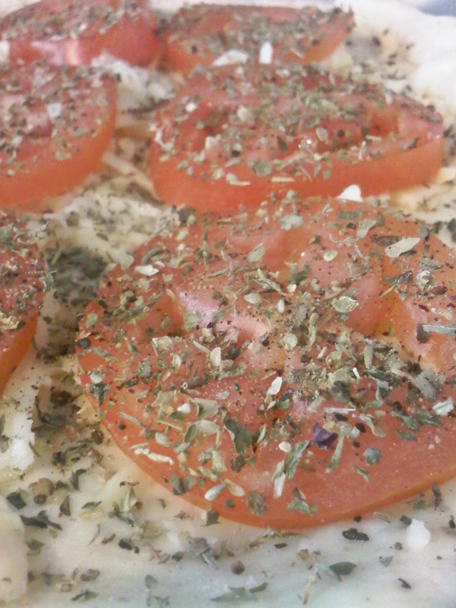 Pizza de tomate con orégano Pizca de Sabor